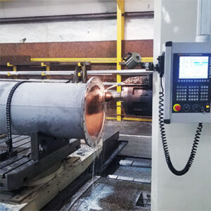CNC boring mill in use for manufacturing precision components for industrial pump systems, essential in pump repairs and service.
