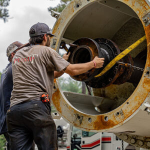 Certified technicians performing inspection of vertical turbine pump prior to shipment at Southeast Pump Specialist.